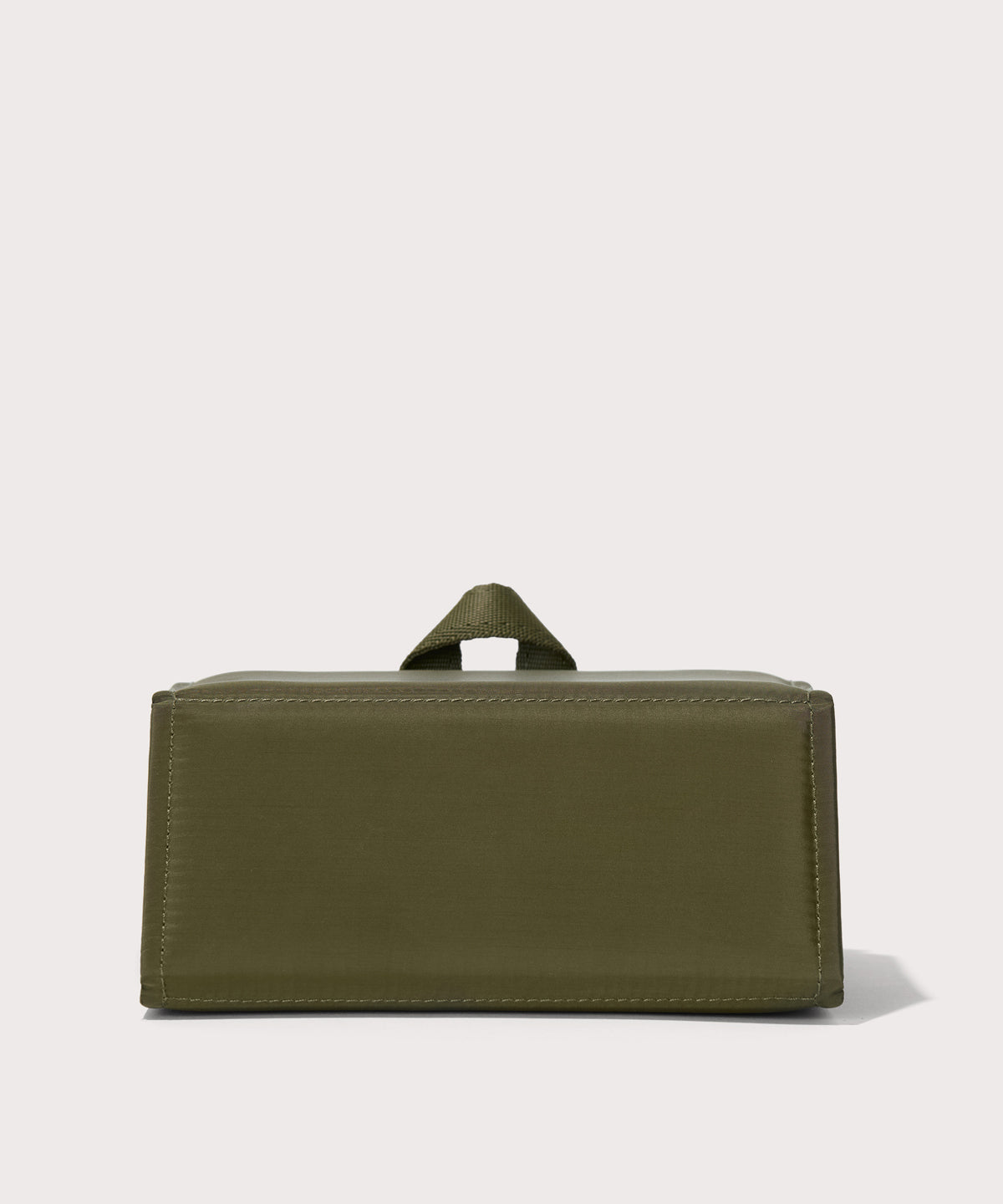 Dagne Dover Remi foldable glasses holder in dark green seen from the back.