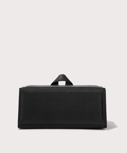 Dagne Dover Remi foldable glasses holder in black seen from the back.