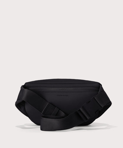 Dagne Dover jax large fanny pack in black seen from the back.