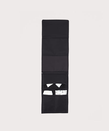 Dagne Dover Joey Changing Kit in black unfolded, revealing the detachable changing mat.