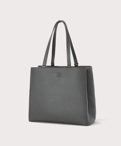 Dagne Dover large Allyn Tote in grey seen from an angle.