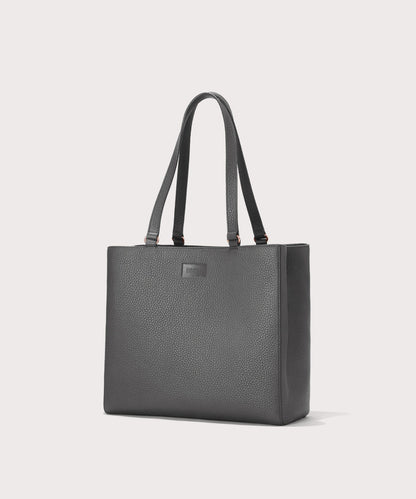 Dagne Dover medium Allyn Tote in grey seen from an angle.