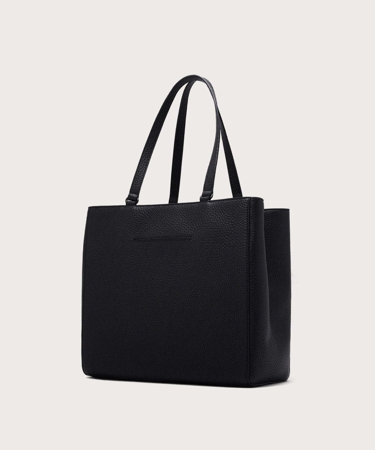 Dagne Dover large Allyn Tote in black with the exterior slip pocket.