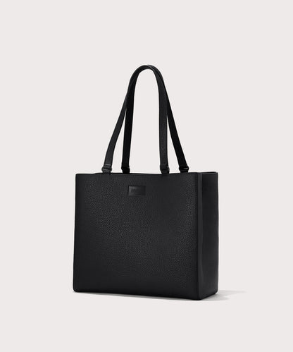 Dagne Dover medium Allyn Tote in black seen from an angle.