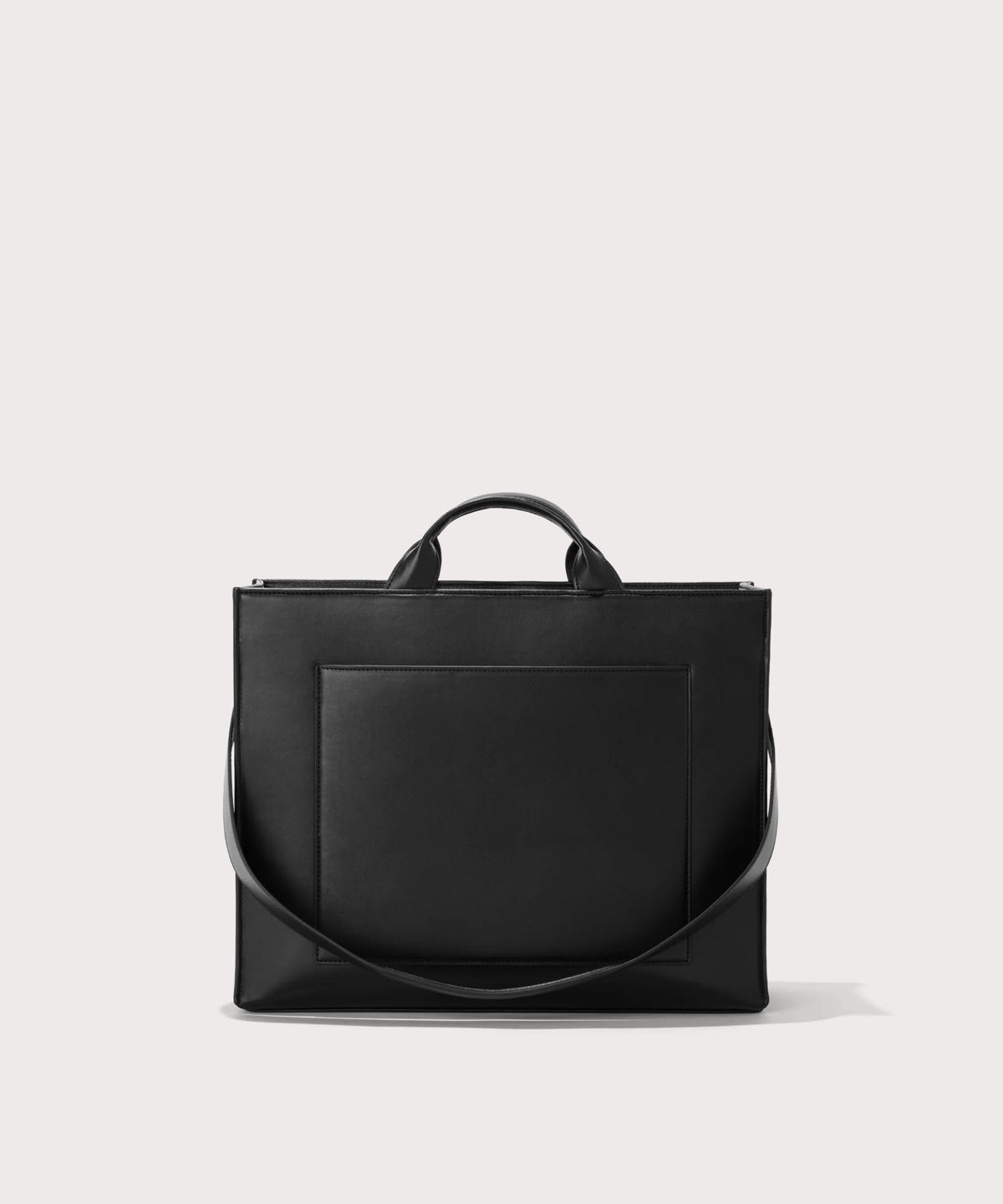 Dagne Dover medium vegan Daily Tote in black with the 11" shoulder strap