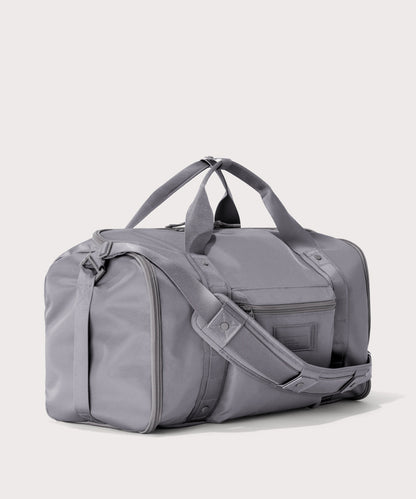 3/4 front view of Monaco garment duffle in a light grey