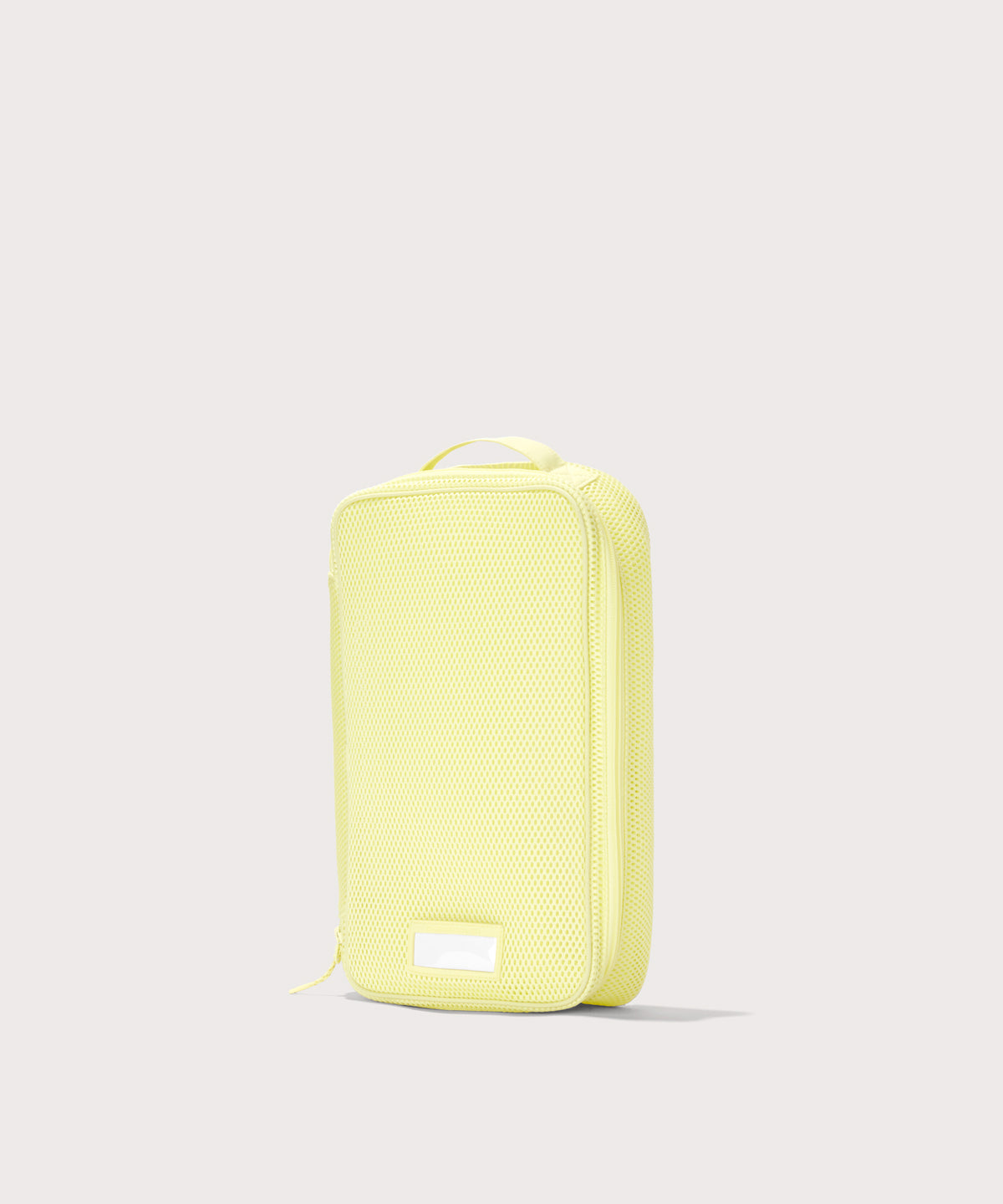3/4 view of medium Roma packing cube in citrine