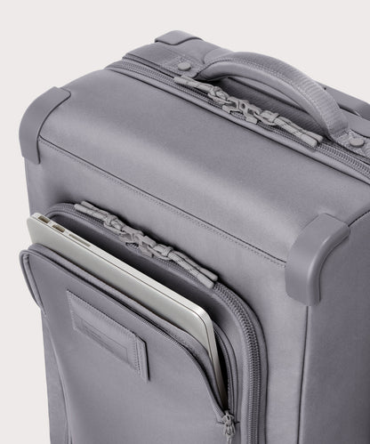 Caption: Front pocket fits most 15” laptops