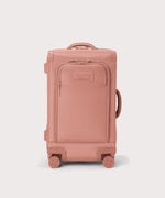 Front view of Seattle carry-on rolling luggage 23.5” in warm dust pink