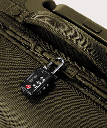 Detail shot of Seattle carry-on rolling luggage 20.5” in dark green lockable zipper heads. Lock not included.