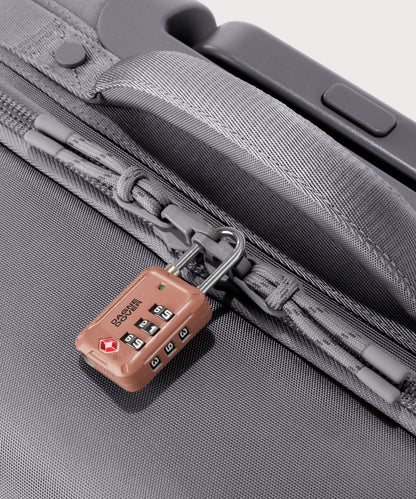 Detail shot of Seattle carry-on rolling luggage 23.5” in light grey lockable zipper heads. Lock not included.